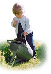 Chloe with watering can