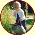 Young girl watering a snail