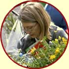 Woman reading amongst plants