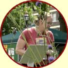 woman behind foliage